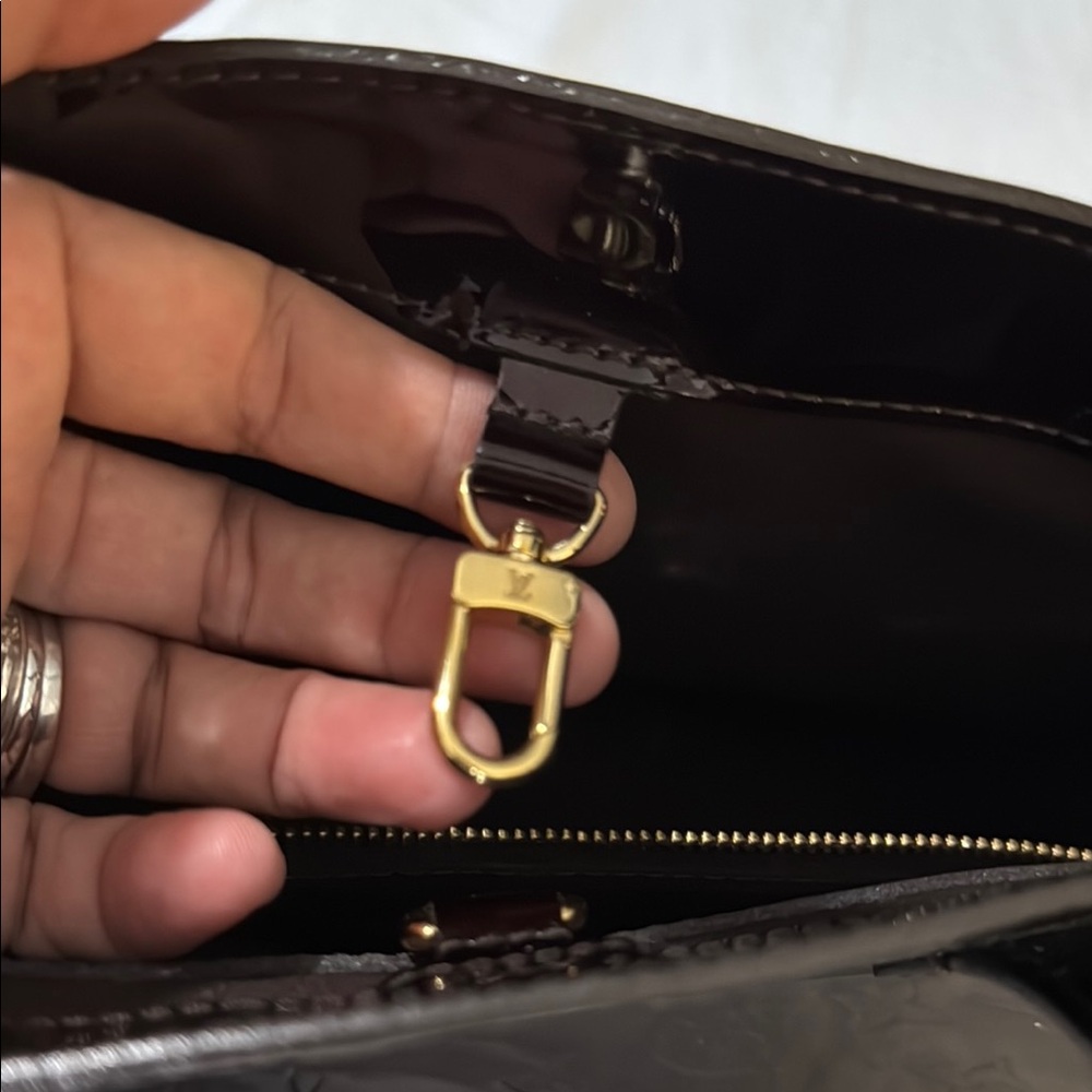 Louis Vuitton Dark Brown Leather Bag with Gold Accent
